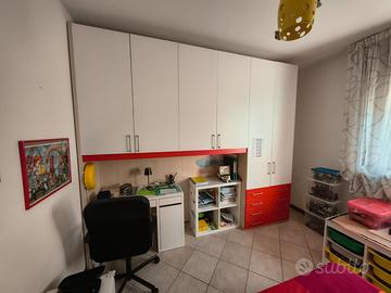 Cameretta: armadio a ponte + letto + libreria