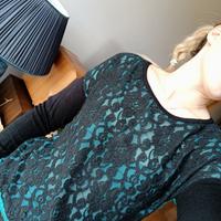 Maglia elegante verde con pizzo nero