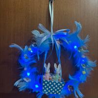 Ghirlanda pasquale luminosa con coniglietti