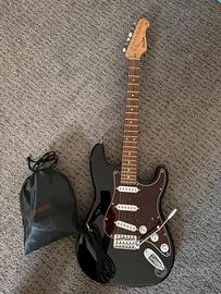 Chitarra Elettrica Harley Benton e Cuffie SL.