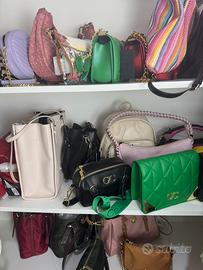 Lotto di 103  articoli guess polo k-way versace