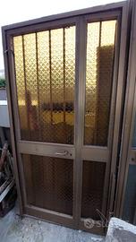 Porta in allum. doppia anta rinforzata di ingresso