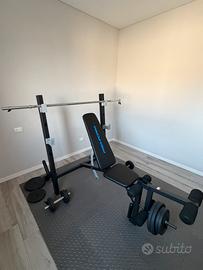 Panca palestra con pesi
