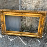 Cornice in legno foglia oro