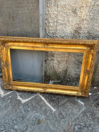 Cornice in legno foglia oro