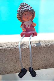 Statuetta in resina.