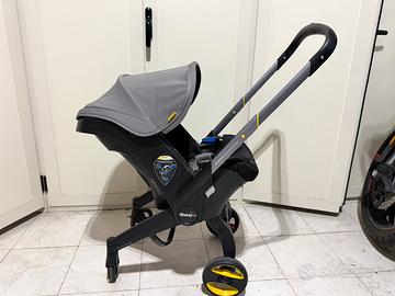 Ovetto sediolino Passeggino Doona + base isofix