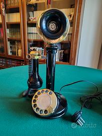 Telefono vintage a candelabro nero e oro 