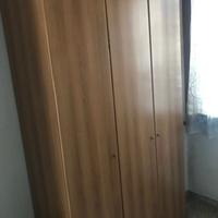 Armadio in legno tre ante