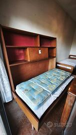 Mobile con letto a scomparsa e vano a ribalta