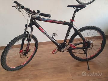 MTB Carbonio permuto con monopattino