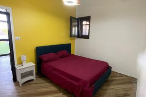 Mini appartamento e stanze con bagno in camera