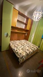 Stanza con letto grande per una sola persona