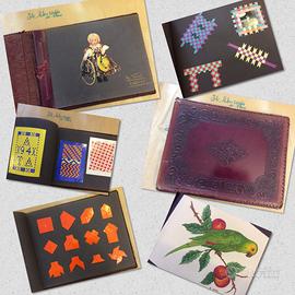 Album di 34 pagine, con origami, intarsi, intagli,