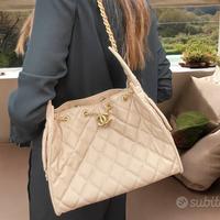Borsa in caviar matelassè color beige chiaro