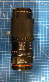 Minolta 75-150 mm zoom f4 con adattatore Sony E/FE