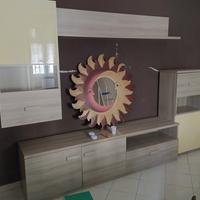 Parete attrezzata e divano letto 