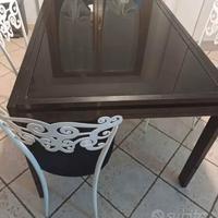 tavolo in vetro e acciaio 