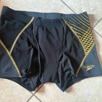 Costume Speedo nero e oro