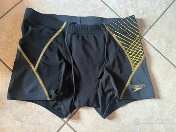 Costume Speedo nero e oro