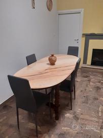 Tavolo ovale con pietra onice rosa
