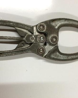 Pinza a ginocchiera autobloccante