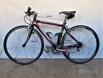 Bicicletta ibrida Merckx in carbonio super leggera