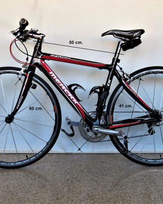 Bicicletta ibrida Merckx in carbonio super leggera