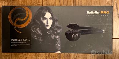 Piastra per capelli ricci. Babyliss  Perfect curl 