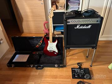 Chitarra con pedaliera e amplificatore