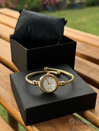 Orologio elegante (nuovo in scatola) + fiore