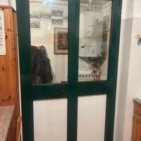 Due serramenti in alluminio, porta e finestra