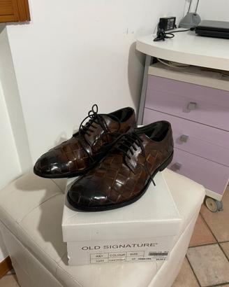 Stringate in pelle intrecciata