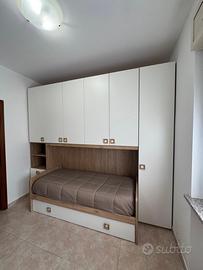 Camera da letto con letti singoli a ponte