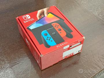 Nintendo Switch Oled 7" 64GB con Joy-Con rosso e b