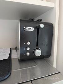De Longhi Tostapane con Pinze, 3  funzioni