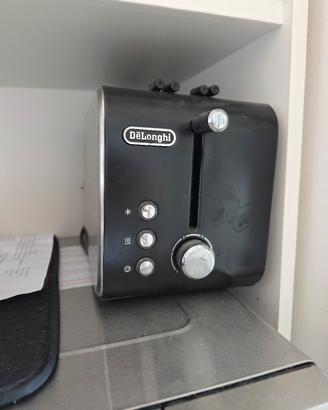 De Longhi Tostapane con Pinze, 3  funzioni