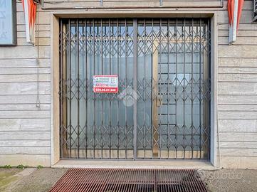 NEGOZIO A TRAVAGLIATO