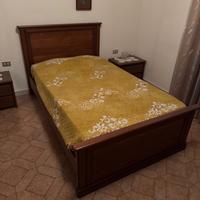 Letto a una piazza e mezza in legno con rete