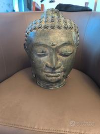 Antica statua in bronzo di Budd