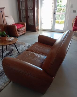 divano e poltrona in pelle stile vintage 