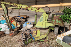 Caricatore/escavatore trainato