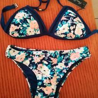 costume nuovo con cartellino