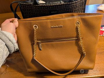 Borsa shopping M. Kors e Replay