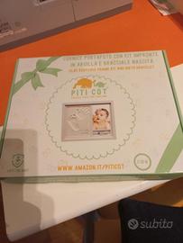 Portafoto con kit per impronte