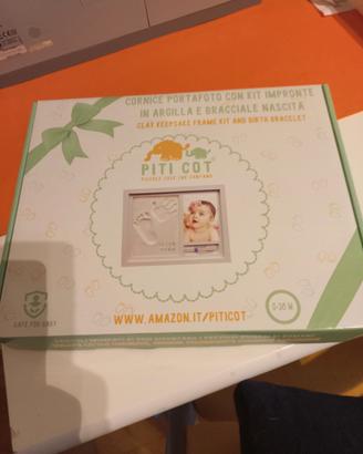 Portafoto con kit per impronte