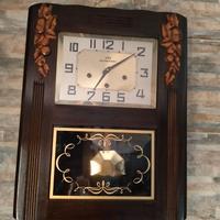 Orologio pendolo a parete