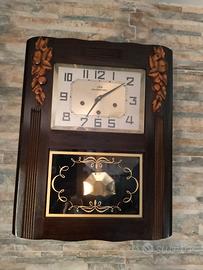 Orologio pendolo a parete