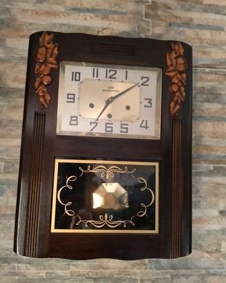 Orologio pendolo a parete