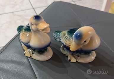 Coppia di Anatre in porcellana dipinte a mano